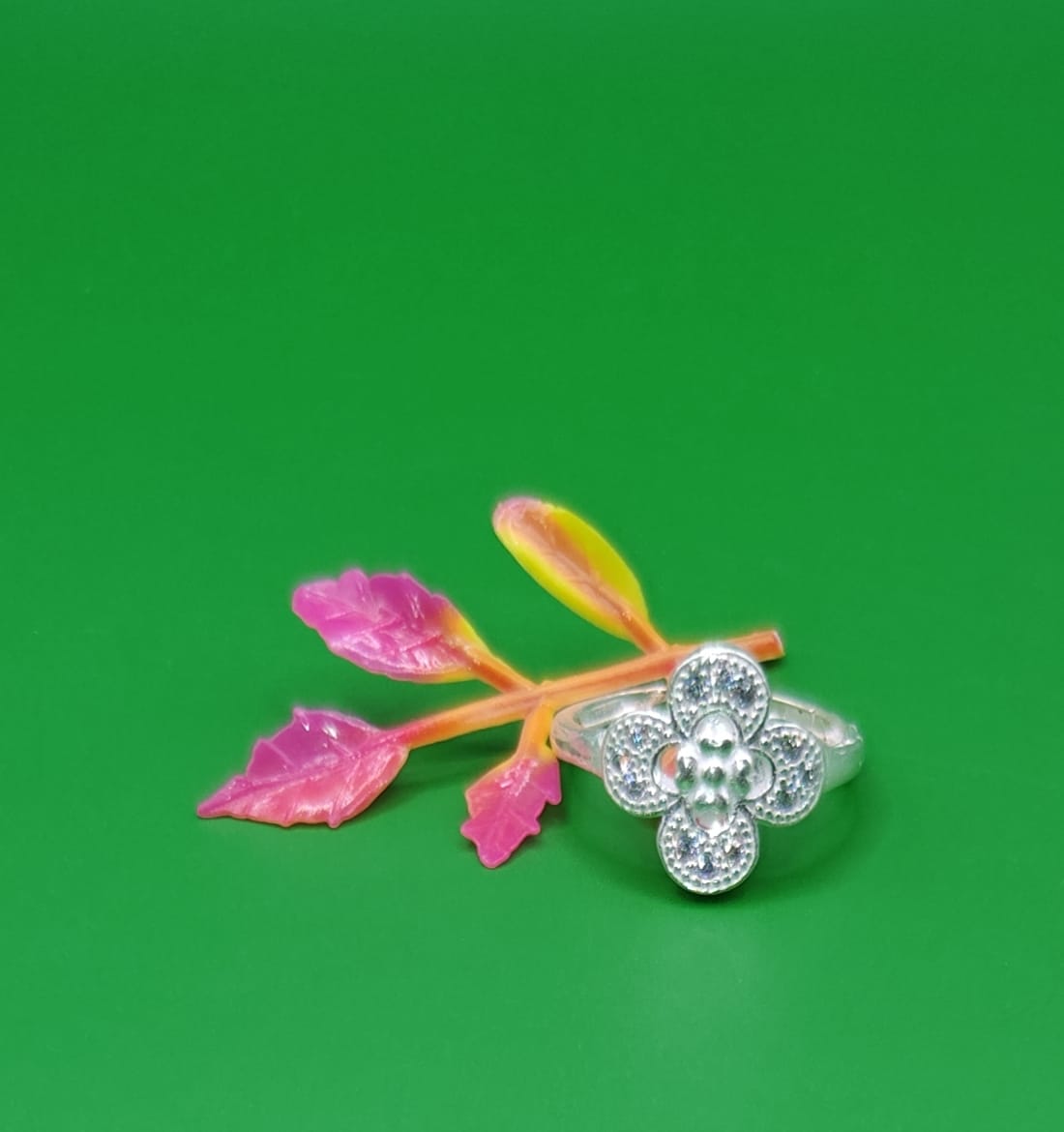 Aabha Glittering Flower Ring with Green Stone