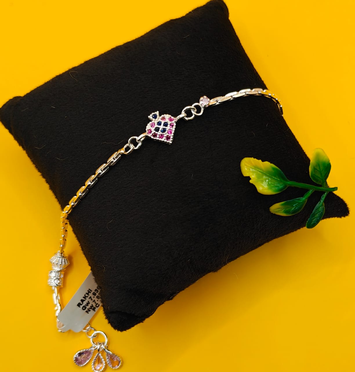 Silver-Plated Heart & Peacock Stone Rakhi Bracelet for Raksha Bandhan